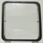 LH REAR BARN DOOR GLASS HEATED GREEN